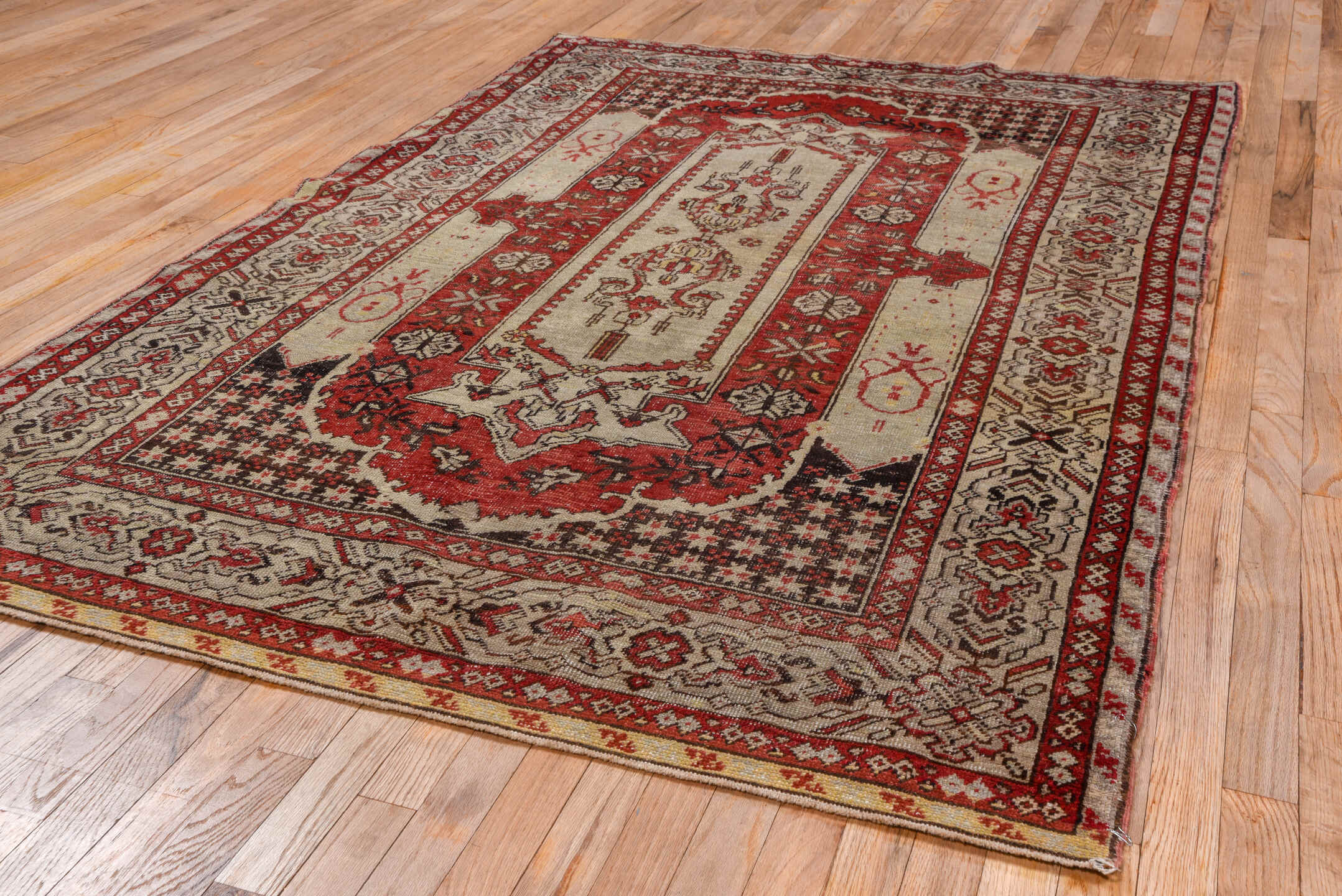 4' x 7' one-of-a-kind handmade vintage Oushak rug. Color palette: brown, gray, pink, red, redwood