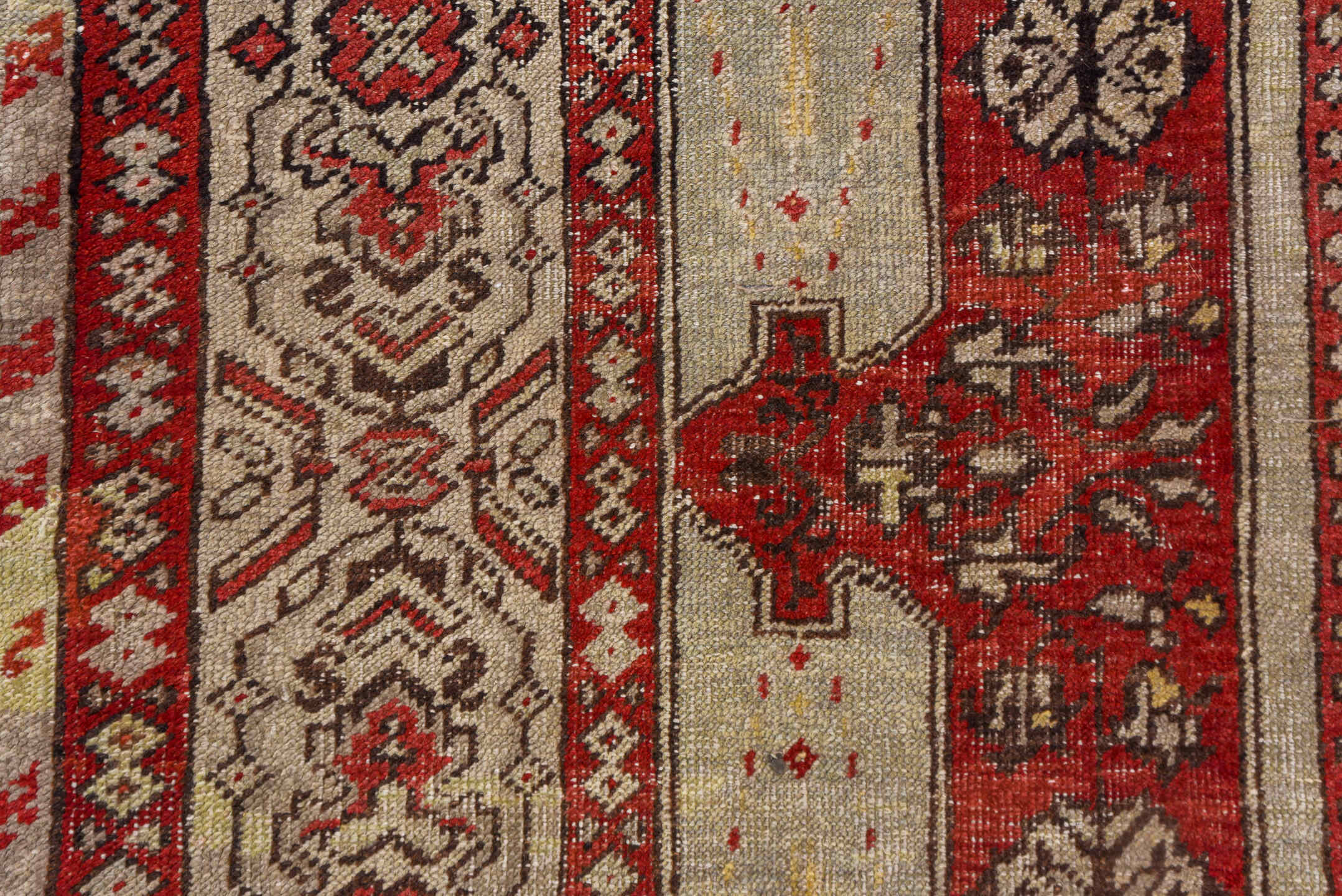 4' x 7' one-of-a-kind handmade vintage Oushak rug. Color palette: brown, gray, pink, red, redwood
