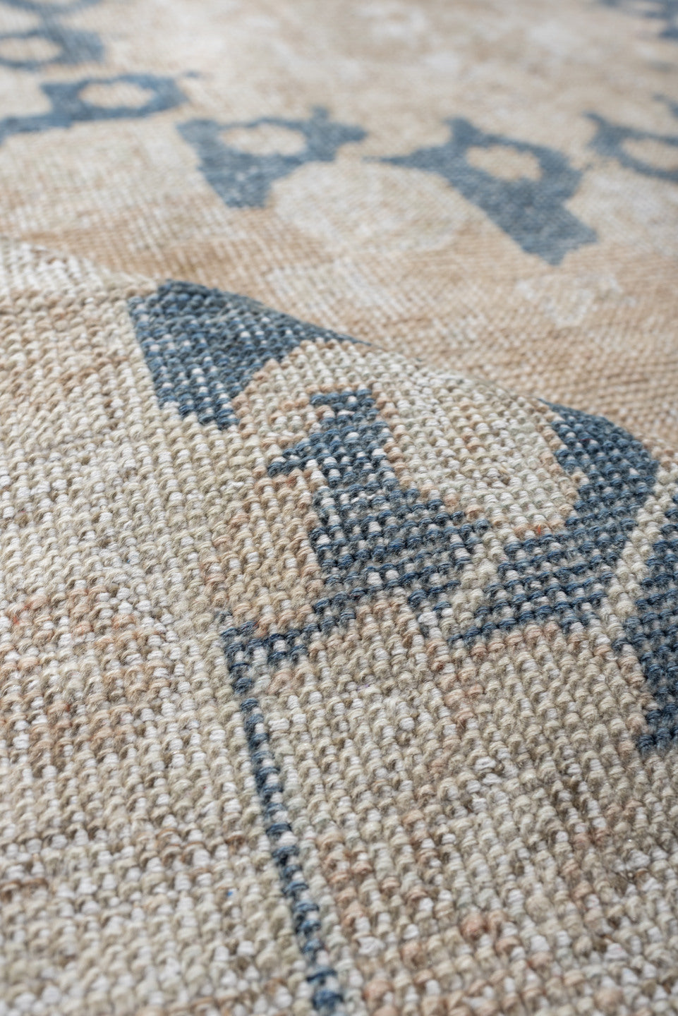 4' x 6' one-of-a-kind handmade antique Anatolian rug. Color palette: ivory, beige, muted blue, taupe, sand, camel, blue
