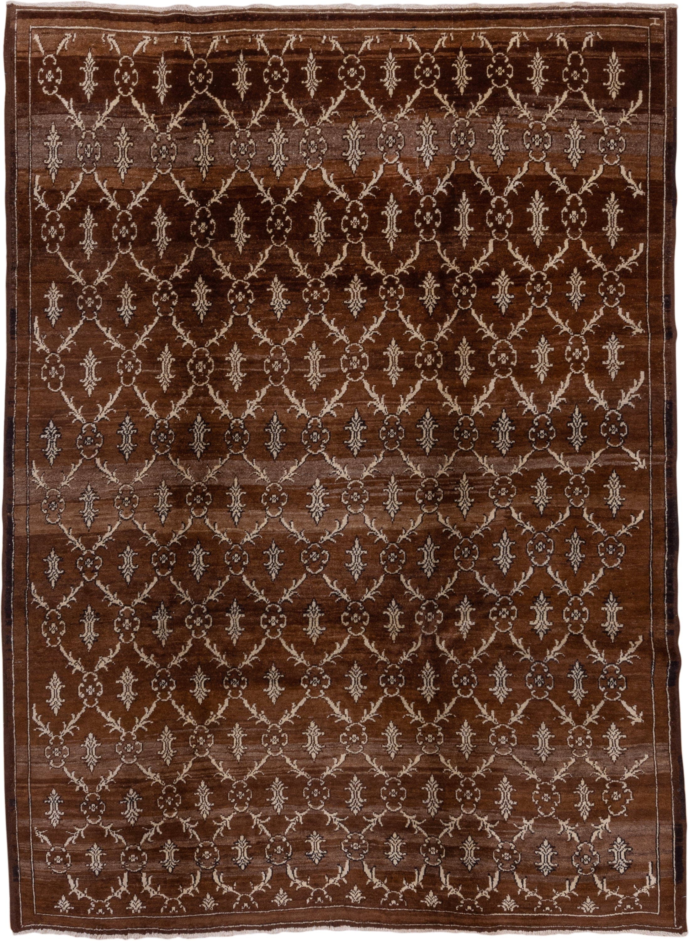 7' x 9' one-of-a-kind handmade vintage Kars rug. Color palette: brown, ivory, taupe, camel, charcoal, beige, gray, black