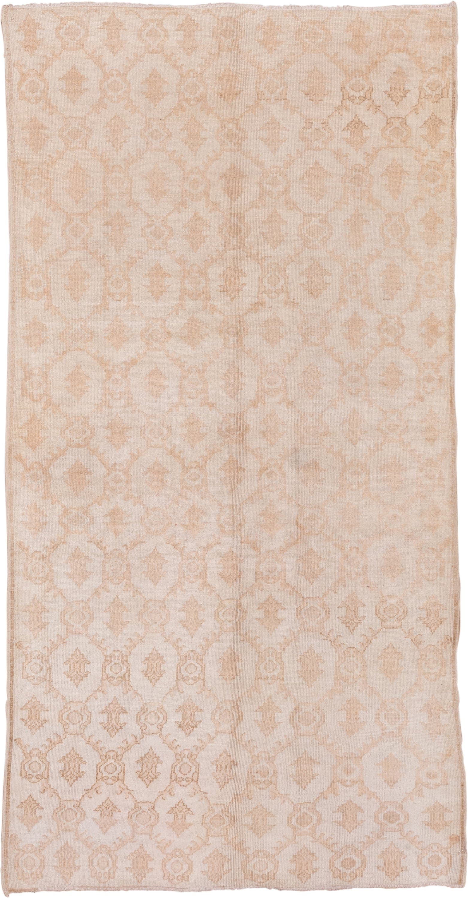 5' x 10' one-of-a-kind handmade vintage Konya medium size rug. Color palette: ivory, blush, peach, taupe, sand, pink