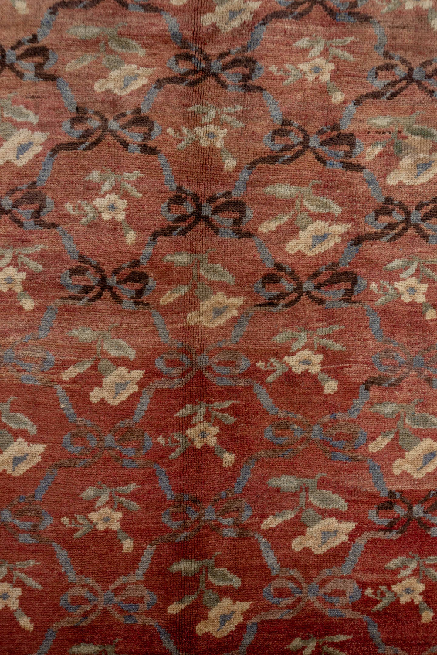 5' x 11' one-of-a-kind handmade vintage Oushak rug. Color palette: terra cotta, rose, ivory, slate, charcoal, sage, rust