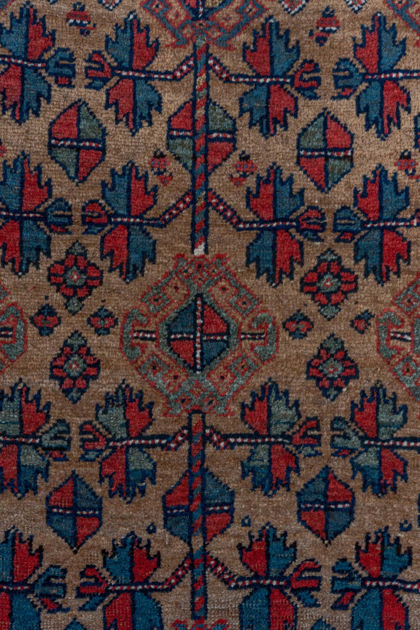 3' x 5' one-of-a-kind handmade vintage Kurd small size rug. Color palette: rust, camel, indigo, ivory, crimson, charcoal