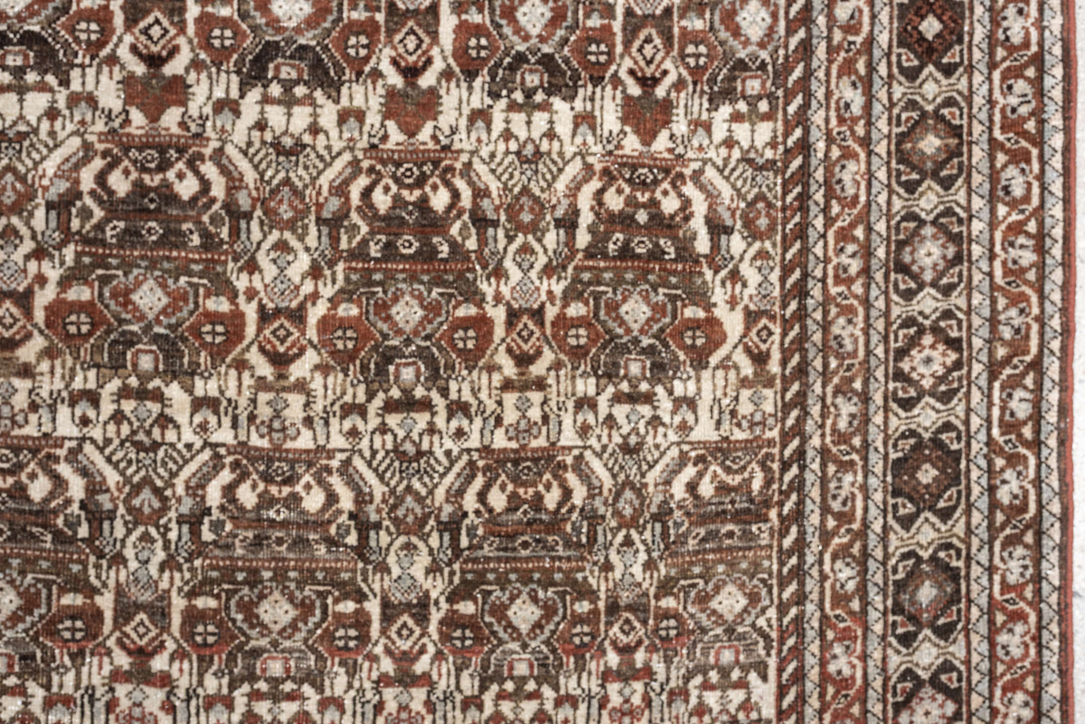 4' x 6' one-of-a-kind handmade antique Abadeh rug. Color palette: ivory, rust, brown, slate, charcoal, taupe, terracotta