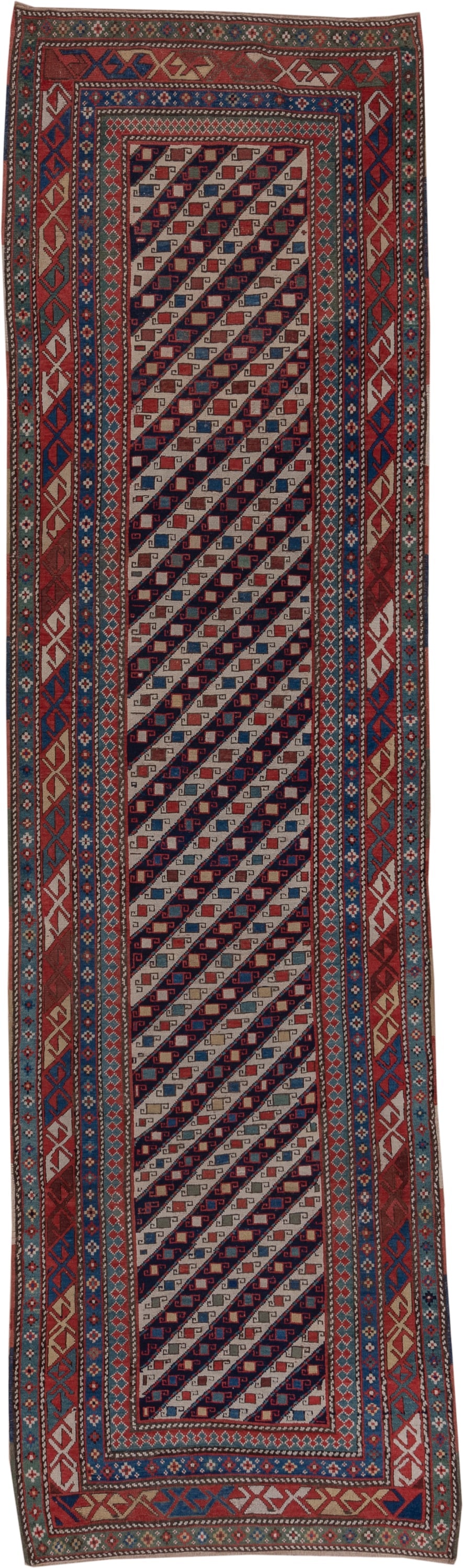 3' x 12' one-of-a-kind handmade vintage Genje runner rug. Color palette: ivory, rust, navy, sky_blue, brick, charcoal