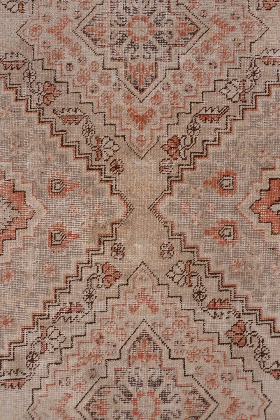 5' x 9' one-of-a-kind handmade antique Khotan medium size rug. Color palette: ivory, taupe, terra cotta, brown, peach