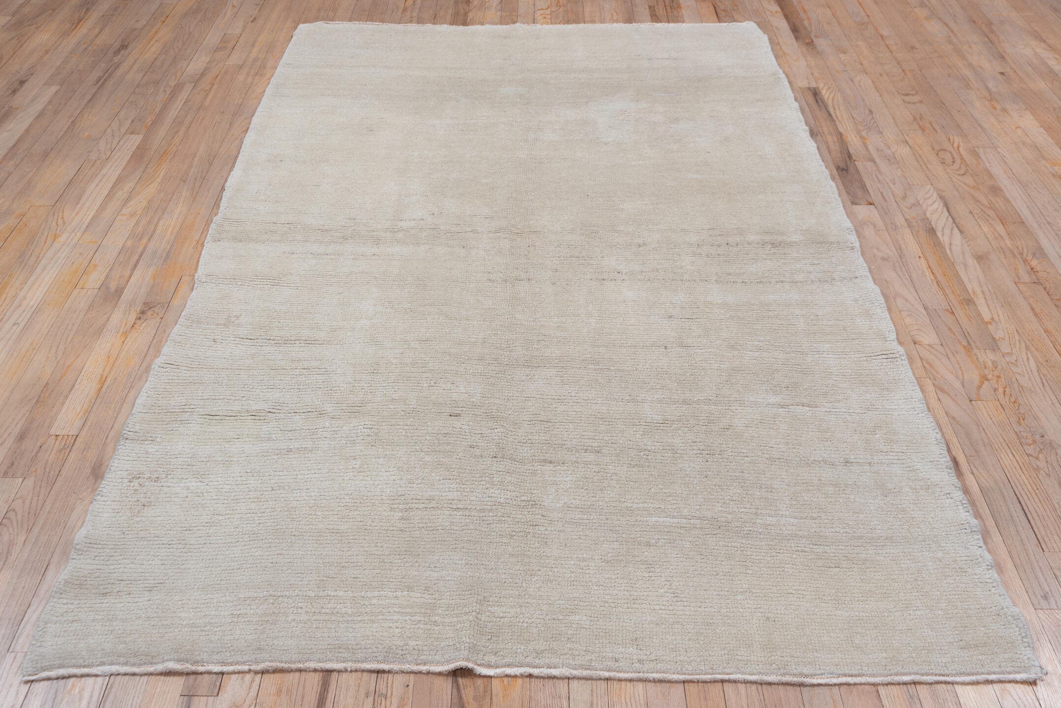 5' x 8' one-of-a-kind handmade antique Tulu medium size rug. Color palette: ivory, cream, beige, taupe, gray