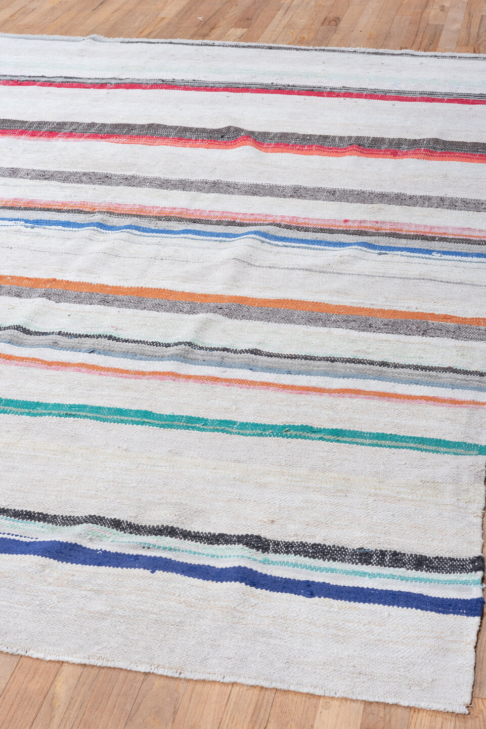 6' x 8' one-of-a-kind handmade vintage Rag Rug medium size rug. Color palette: ivory, charcoal, crimson, orange, cobalt