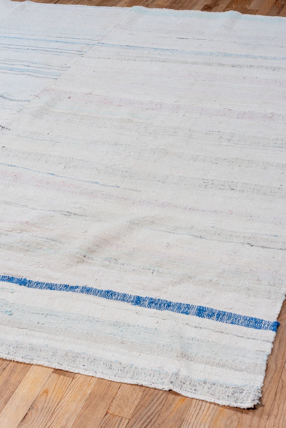 7' x 8' one-of-a-kind handmade vintage Rag Rug rug. Color palette: ivory, pale blue, aqua, light gray, blush, cobalt