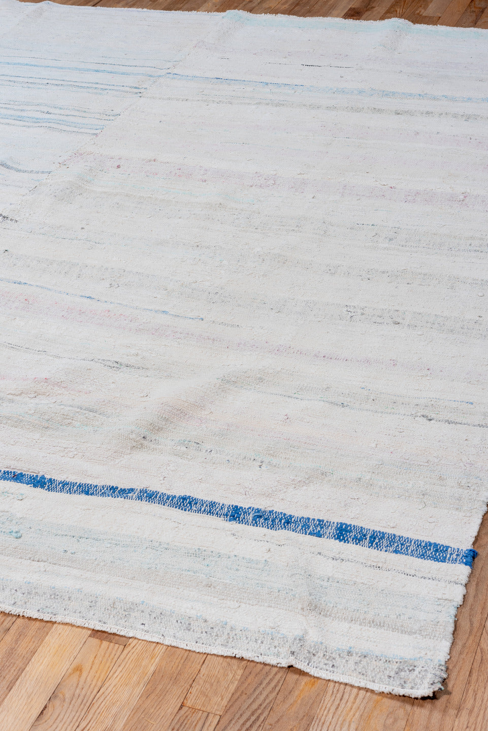 7' x 8' one-of-a-kind handmade vintage Rag Rug rug. Color palette: ivory, pale blue, aqua, light gray, blush, cobalt