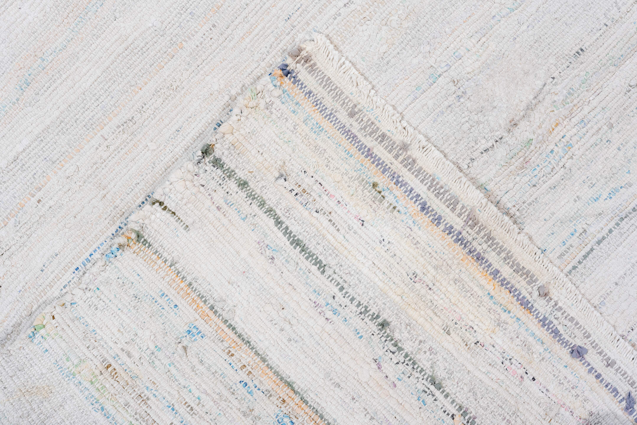 7' x 8' one-of-a-kind handmade vintage Rag Rug rug. Color palette: ivory, pale blue, aqua, light gray, blush, cobalt