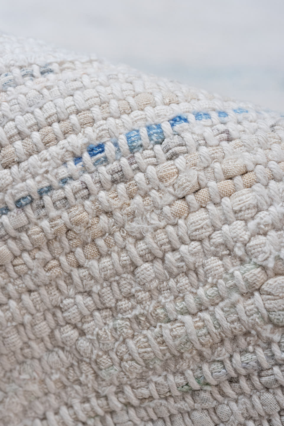 7' x 8' one-of-a-kind handmade vintage Rag Rug rug. Color palette: ivory, pale blue, aqua, light gray, blush, cobalt