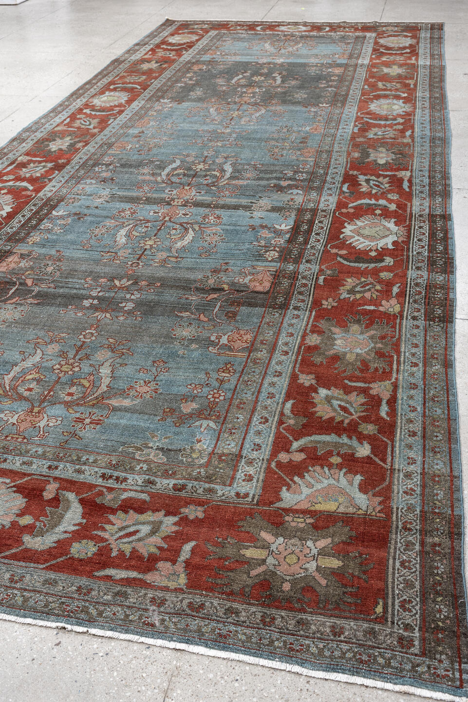 7' x 16' one-of-a-kind handmade antique Lilian rug. Color palette: blue, terracotta, ivory, slate, rose, taupe, charcoal