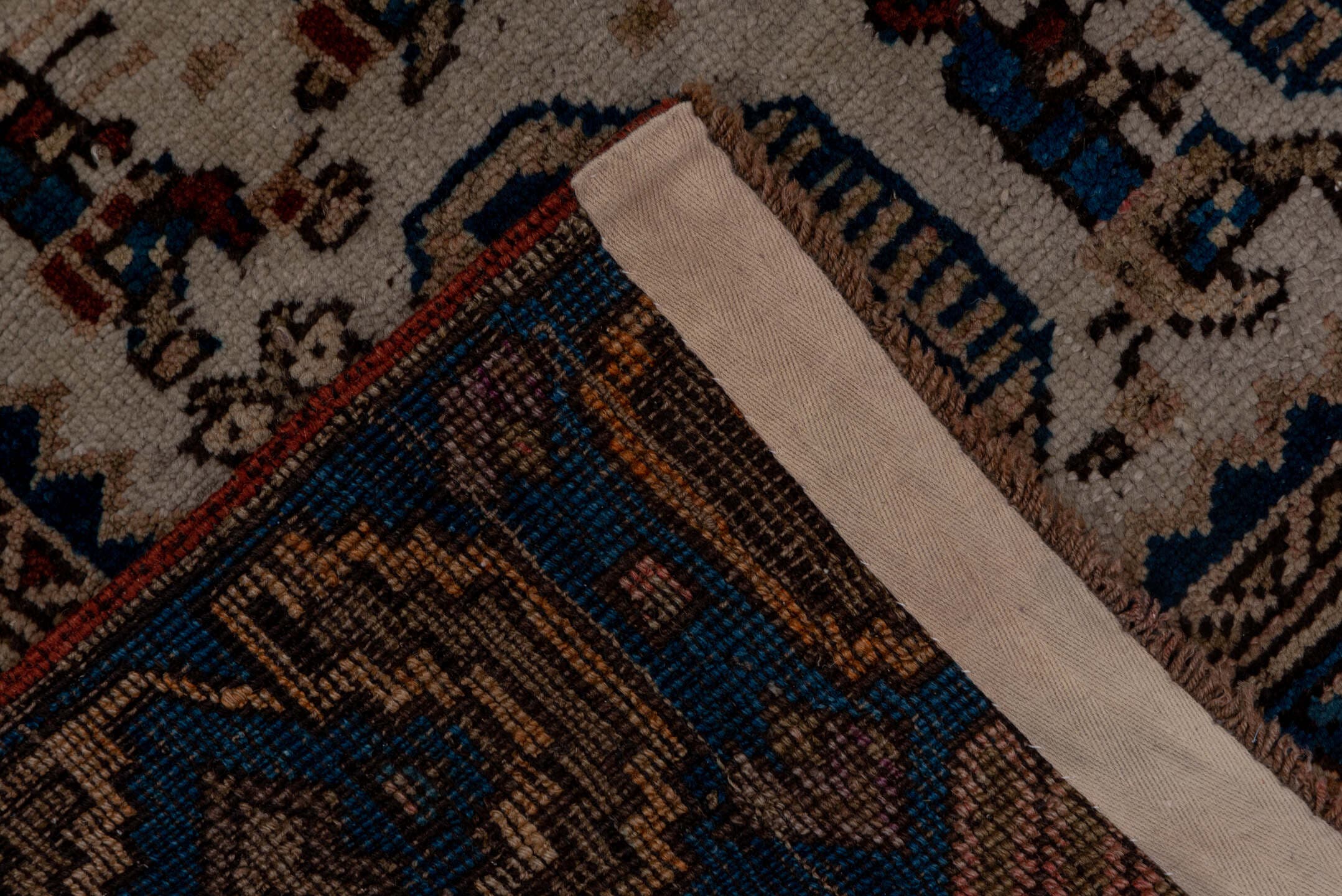 3' x 9' one-of-a-kind handmade antique NW Persian runner rug. Color palette: ivory, indigo, camel, rust, slate, brown