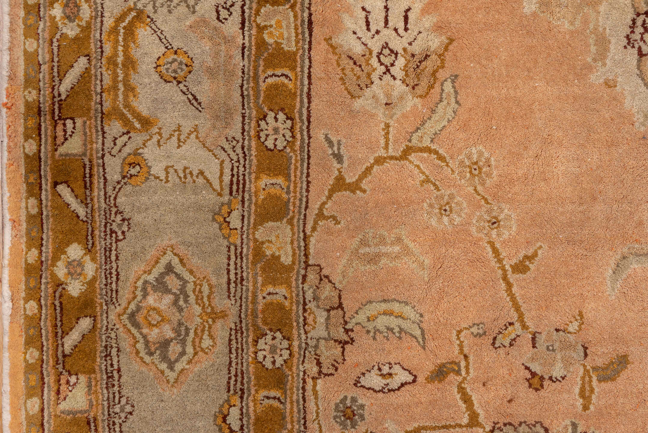 5' x 10' one-of-a-kind handmade antique Agra medium size rug. Color palette: peach, camel, ivory, taupe, gold, olive, brown