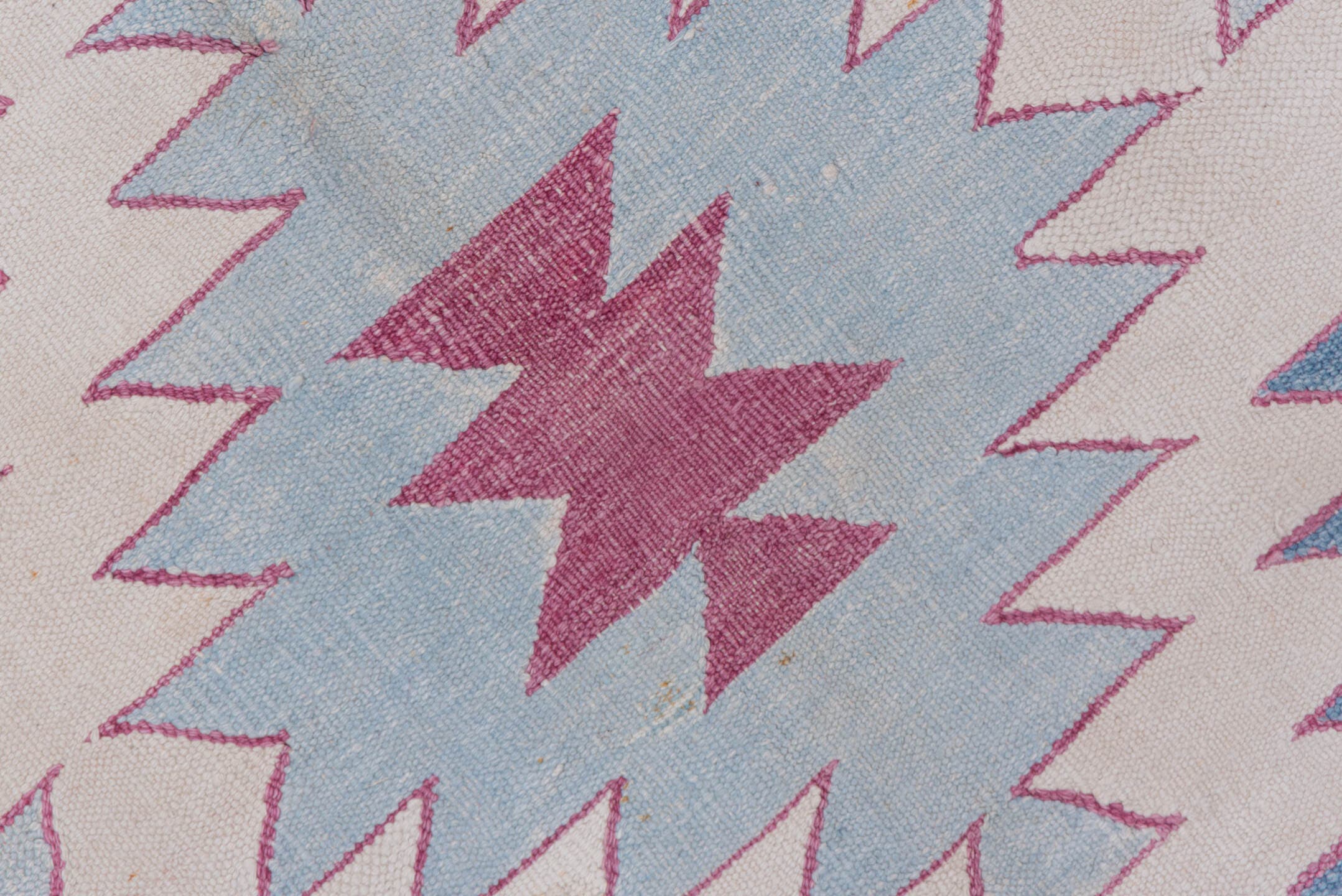 5' x 7' one-of-a-kind handmade antique Dhurrie rug. Color palette: ivory, sky blue, rose, dusty pink, light blue, pink, red
