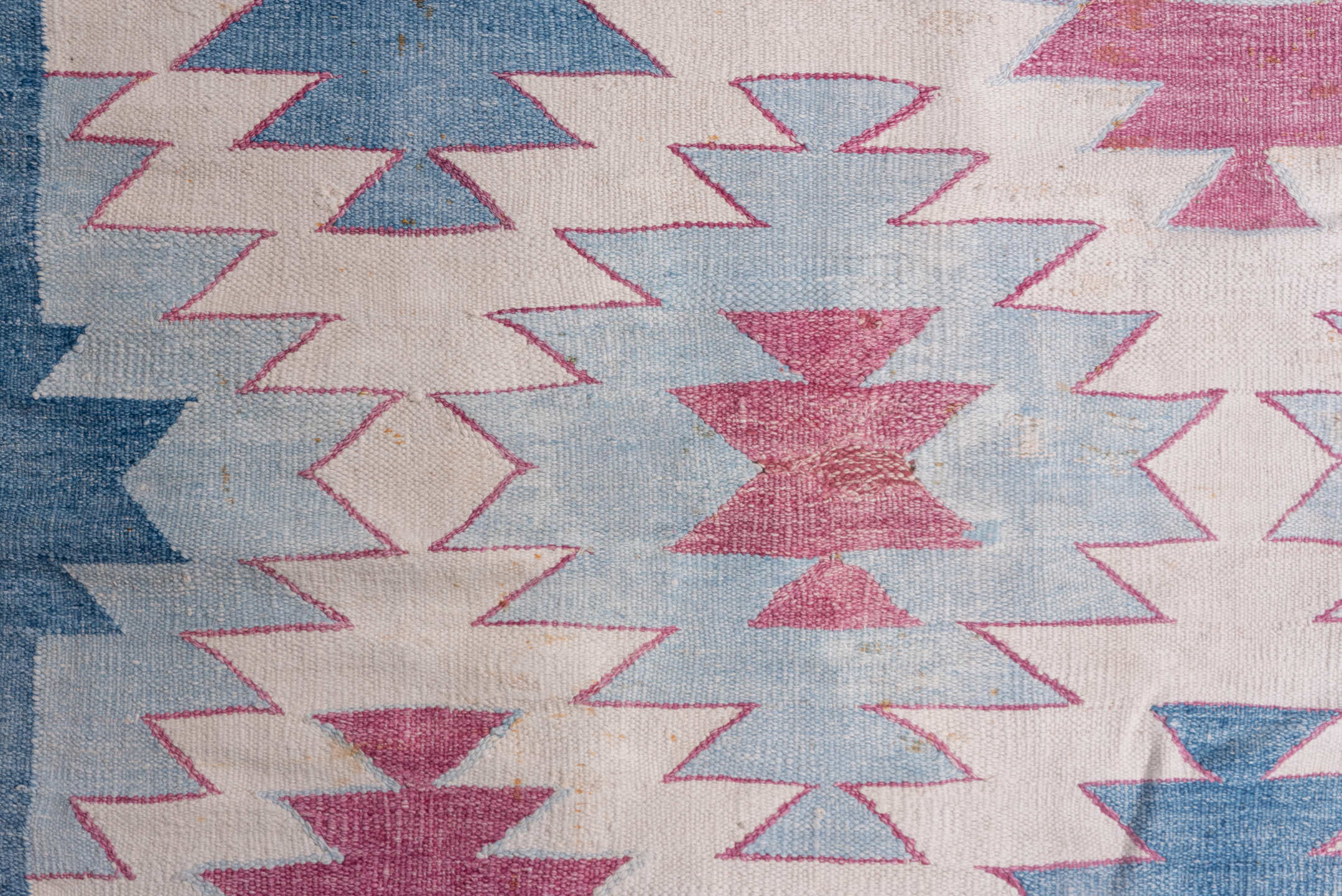 5' x 7' one-of-a-kind handmade antique Dhurrie rug. Color palette: ivory, sky blue, rose, dusty pink, light blue, pink, red