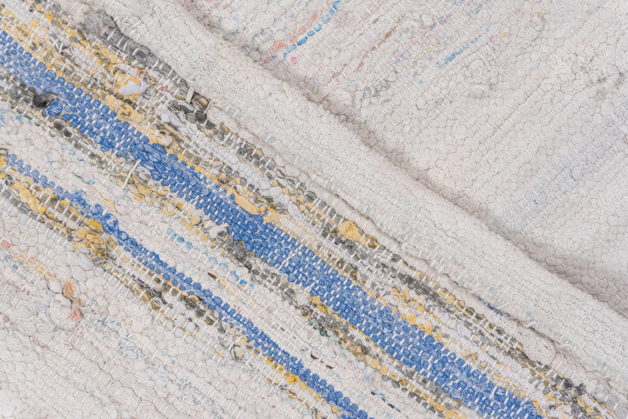 5' x 7' one-of-a-kind handmade antique Rag Rug rug. Color palette: ivory, blush, pale blue, peach, taupe, pink, light blue