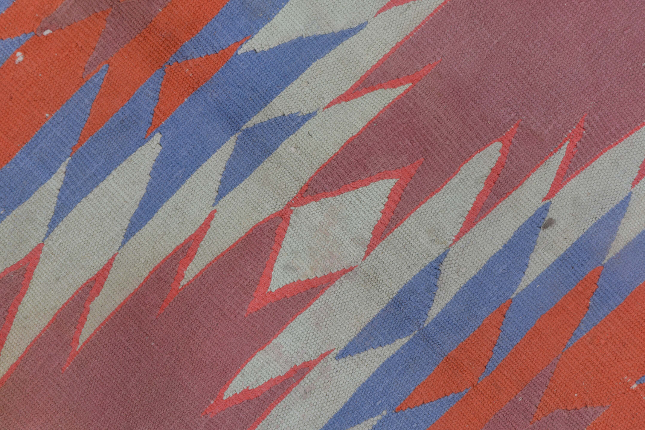 9' x 16' one-of-a-kind handmade antique Dhurrie rug. Color palette: dusty rose, ivory, sky blue, coral, slate blue, pink