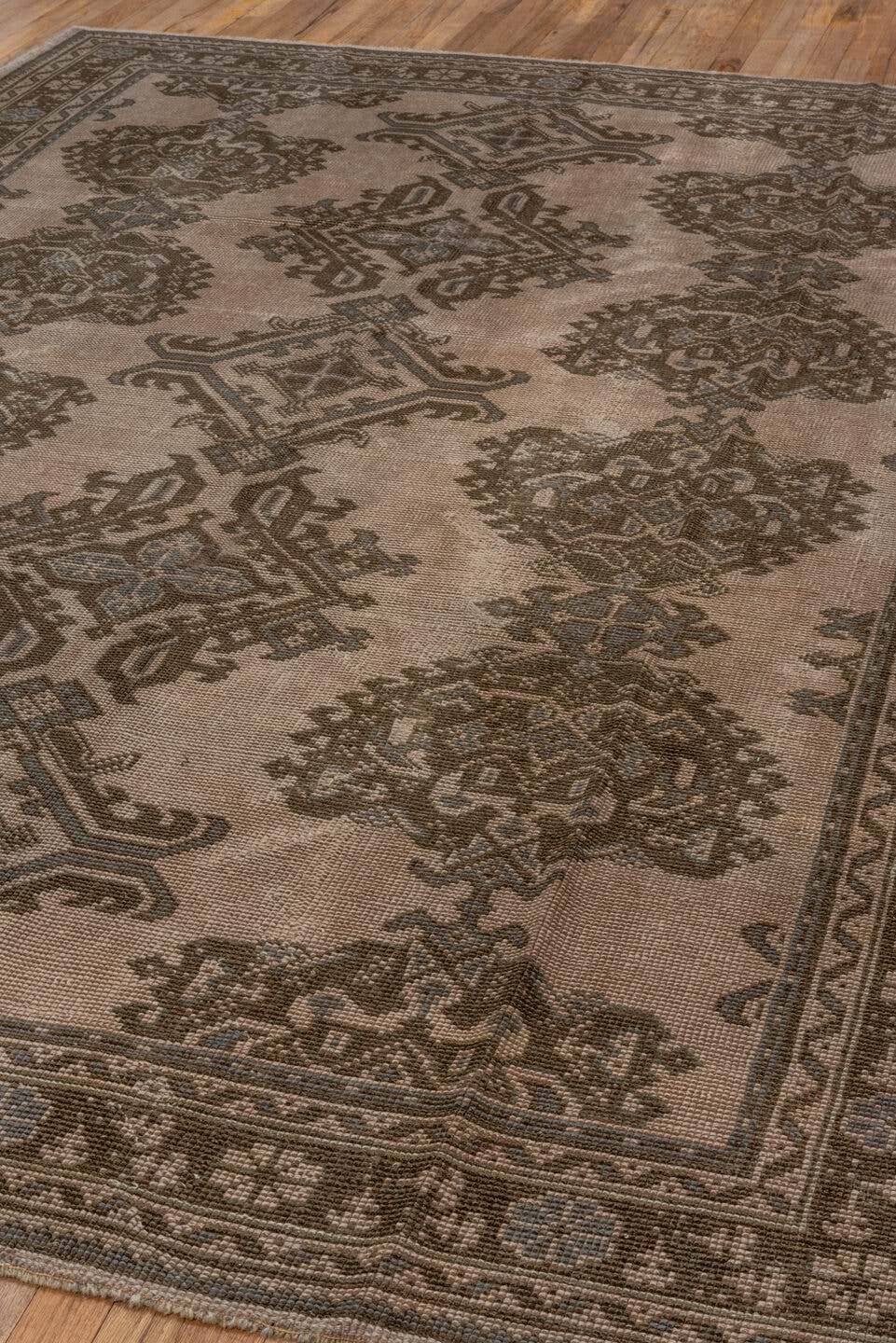 7' x 10' one-of-a-kind handmade antique Oushak large size rug. Color palette: taupe, brown, charcoal, greige, ivory, beige
