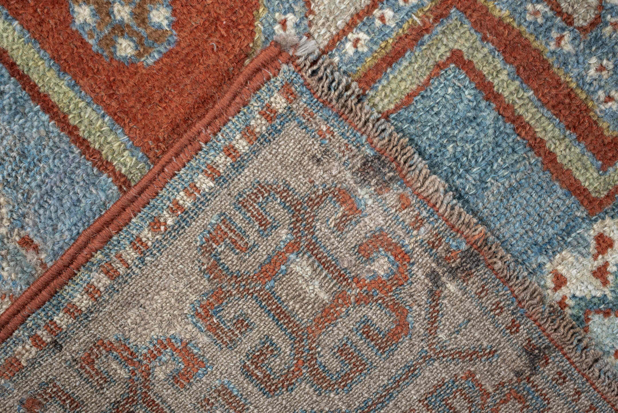 3' x 4' one-of-a-kind handmade antique Caucasian small size rug. Color palette: ivory, sky blue, rust, terra cotta, camel