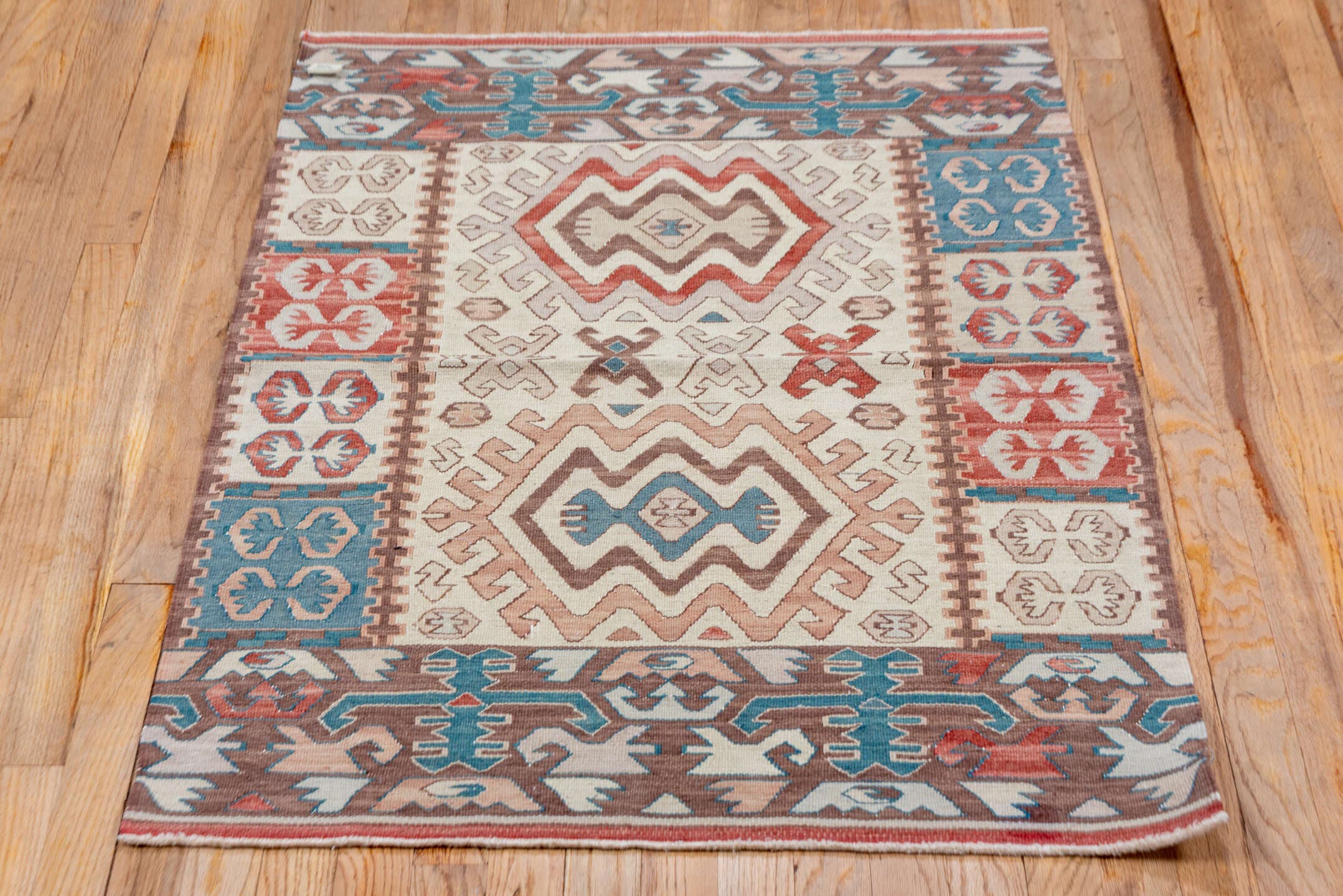 2' x 4' one-of-a-kind handmade antique Kilim small size rug. Color palette: ivory, brown, rust, blue, taupe, rose