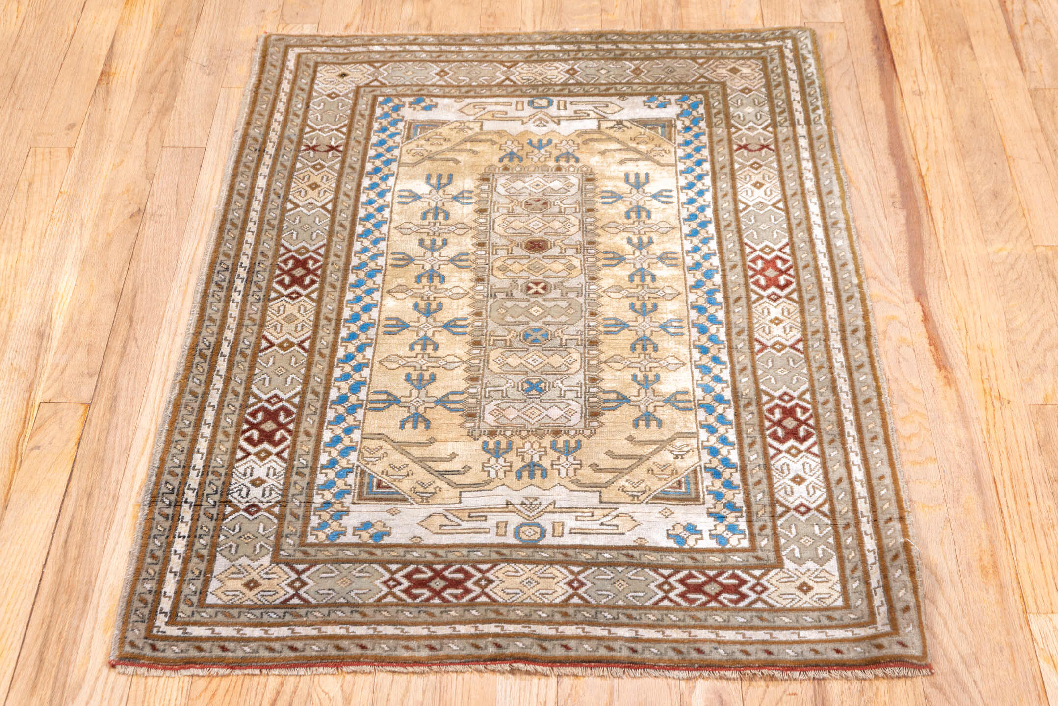 2' x 4' one-of-a-kind handmade vintage Sivas small size rug. Color palette: ivory, taupe, camel, brown, blue, rust, beige