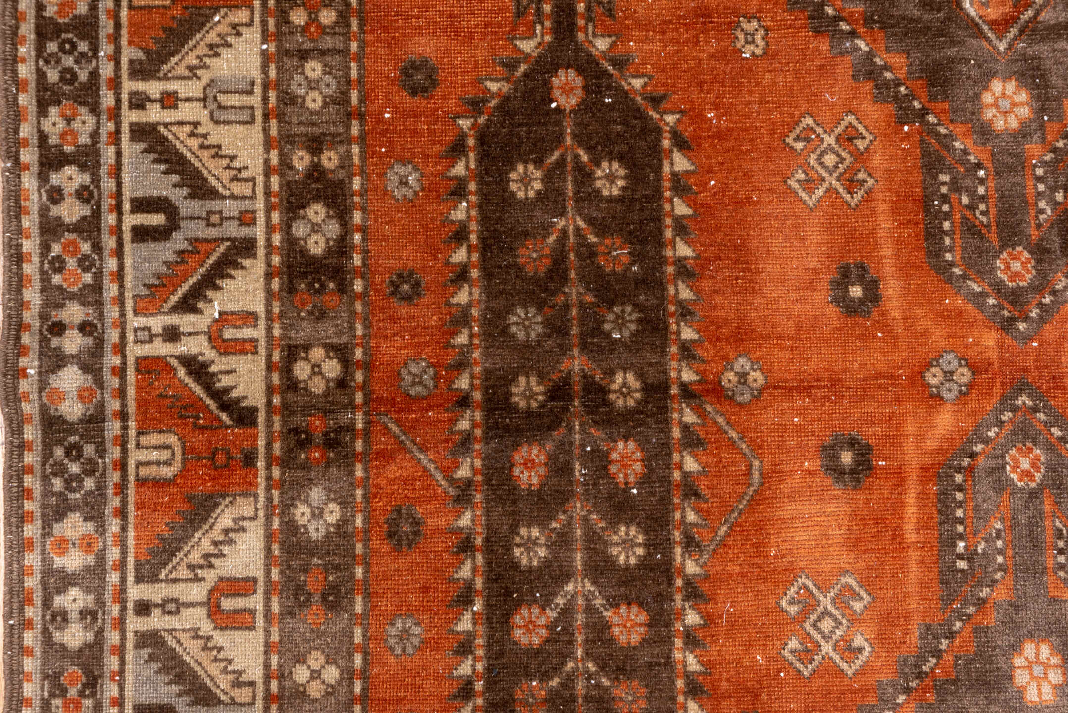 4' x 7' one-of-a-kind handmade vintage Caucasian rug. Color palette: terra cotta, ivory, brown, rust, taupe, charcoal, camel