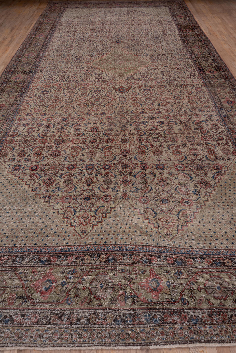 8' x 19' one-of-a-kind handmade antique Farahan rug. Color palette: ivory, taupe, rose, slate, rust, sage, burgundy, beige