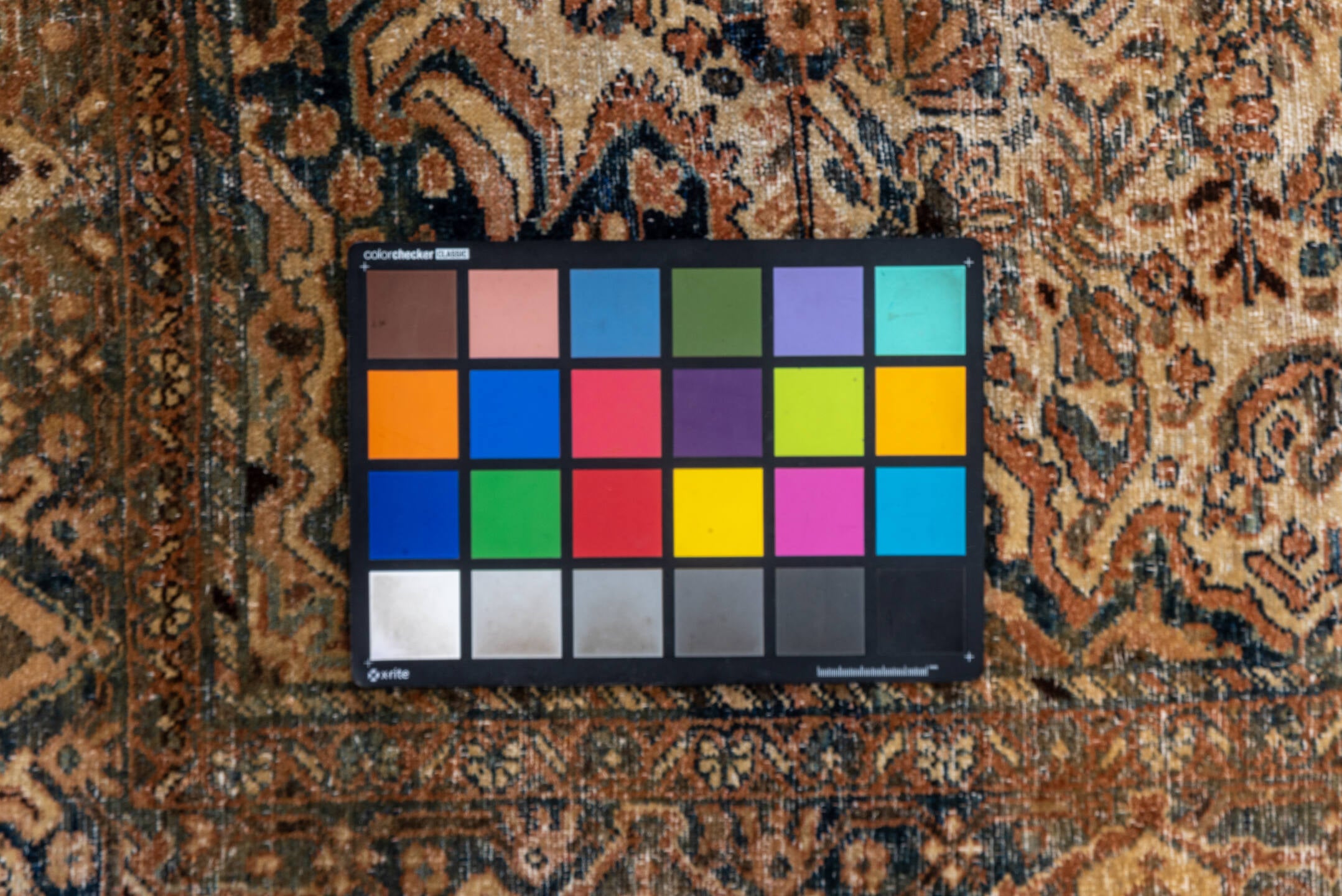 5' x 6' one-of-a-kind handmade vintage Sivas rug. Color palette: black, blue, brown, gray, light gray, off-white, orange