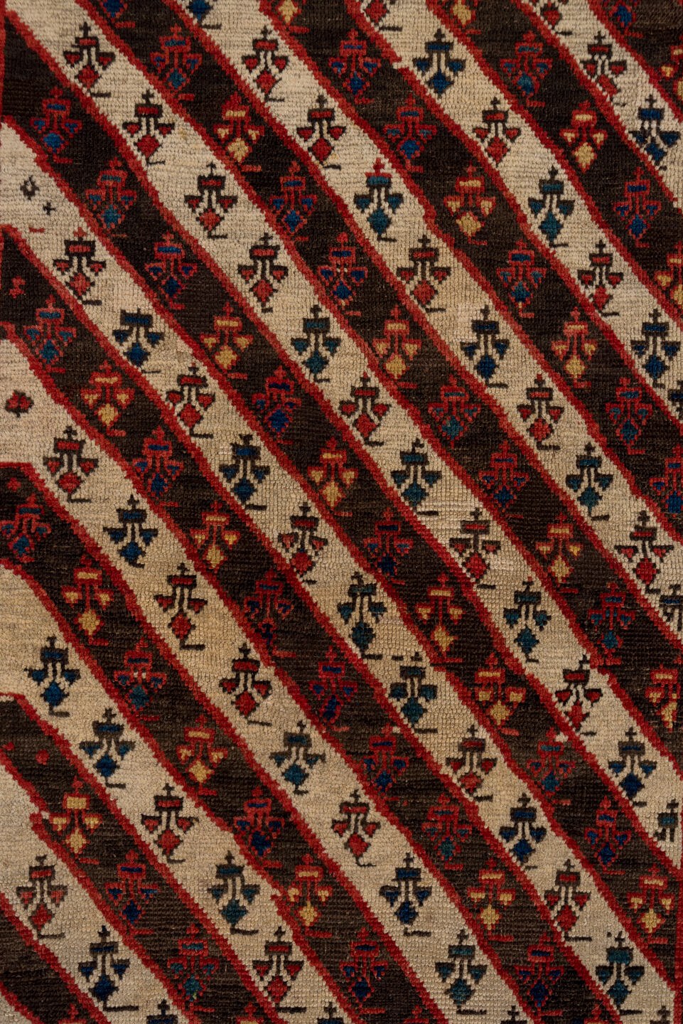 3' x 7' one-of-a-kind handmade vintage Kazak rug. Color palette: ivory, navy, teal, rust, crimson, gold, blue, terracotta