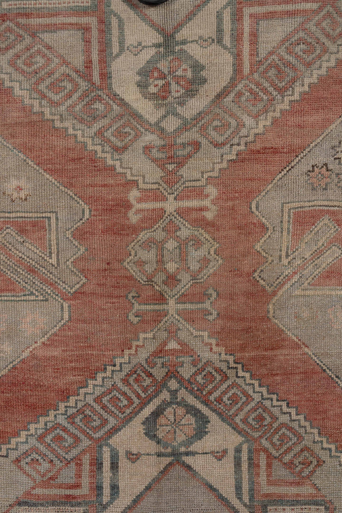 4' x 11' one-of-a-kind handmade vintage Oushak runner rug. Color palette: terra cotta, taupe, sage, ivory, rose, charcoal