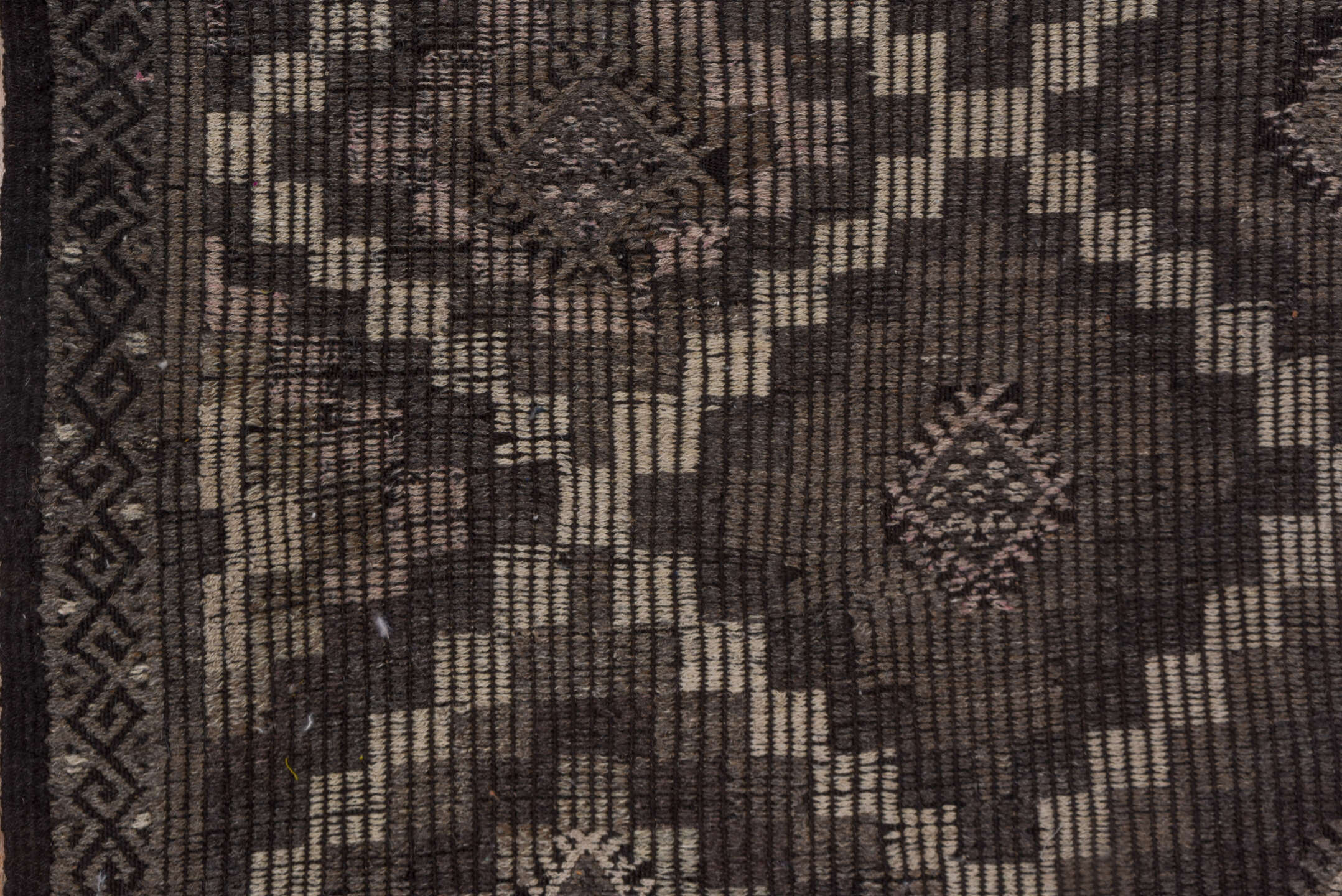 6' x 9' one-of-a-kind handmade vintage Jijim medium size rug. Color palette: charcoal, taupe, brown, ivory, mauve, gray