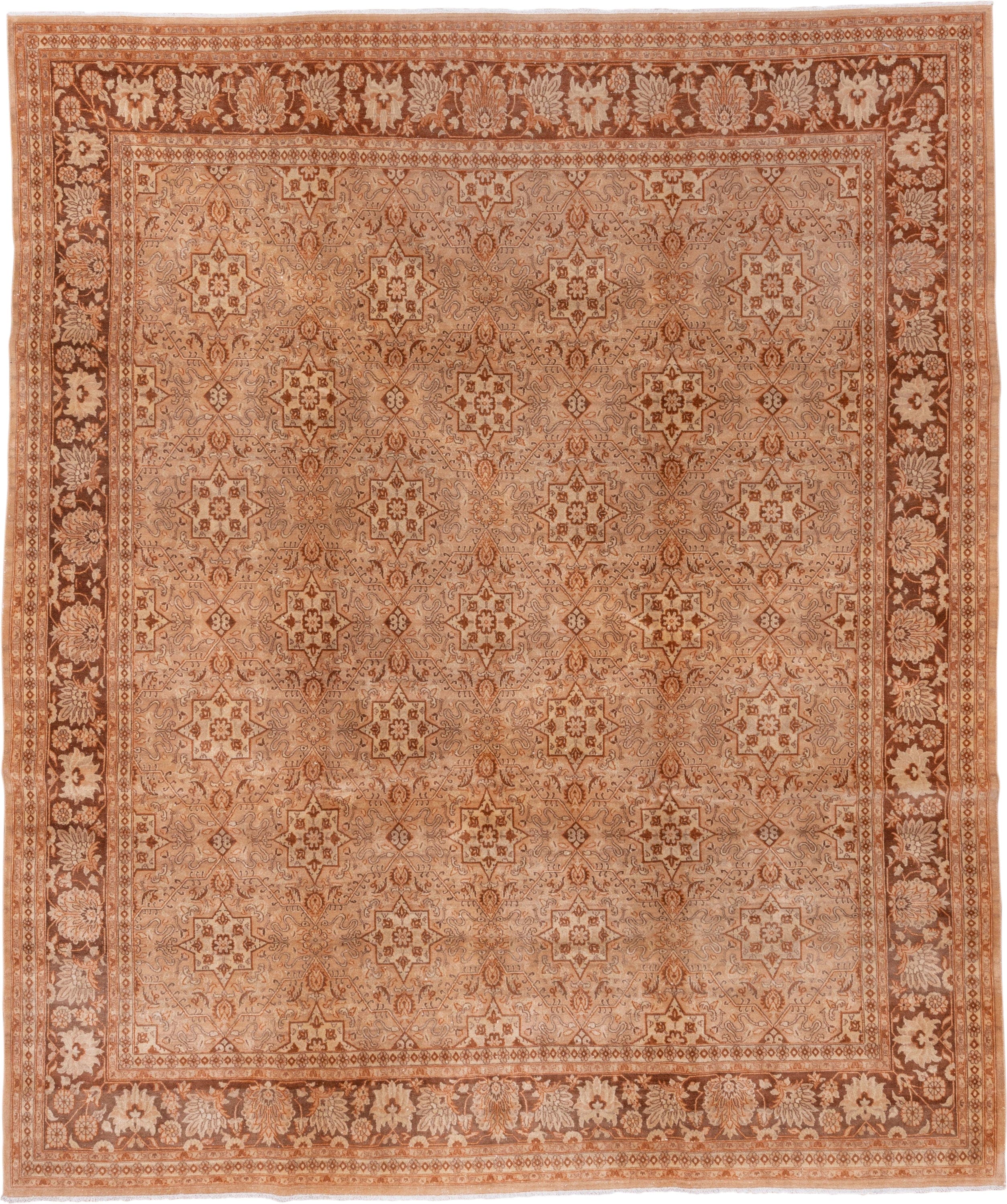 8' x 9' one-of-a-kind handmade vintage Agra rug. Color palette: terra cotta, camel, ivory, rust, taupe, brown, terracotta