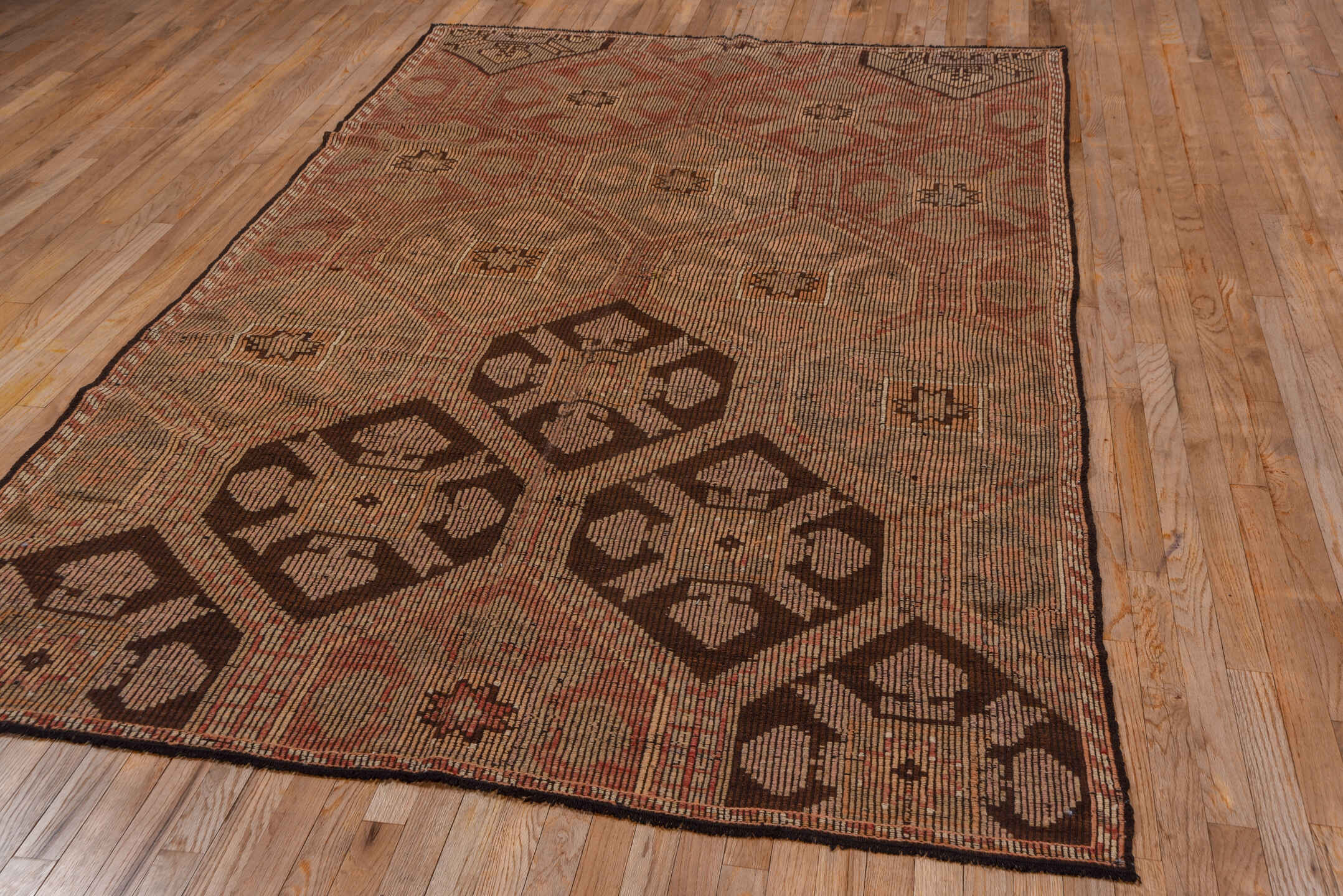 6' x 9' one-of-a-kind handmade vintage Jijim medium size rug. Color palette: camel, taupe, dark brown, terra cotta, rose
