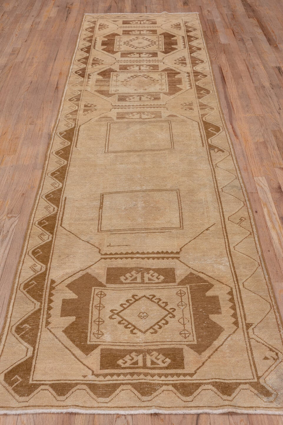 3' x 11' one-of-a-kind handmade vintage Oushak runner rug. Color palette: beige, camel, taupe, sand, brown, ivory, gray