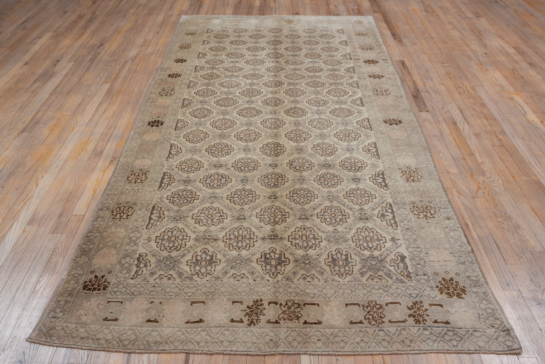 5' x 10' one-of-a-kind handmade vintage Konya medium size rug. Color palette: brown, gray, off-white, orange, pink