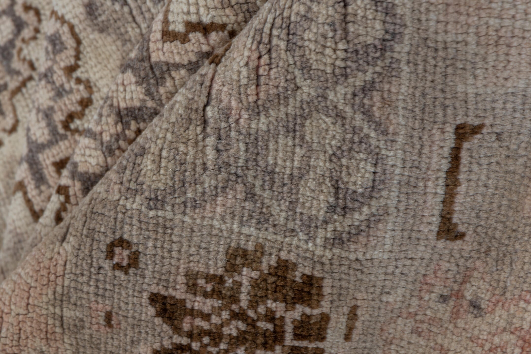 5' x 10' one-of-a-kind handmade vintage Konya medium size rug. Color palette: brown, gray, off-white, orange, pink