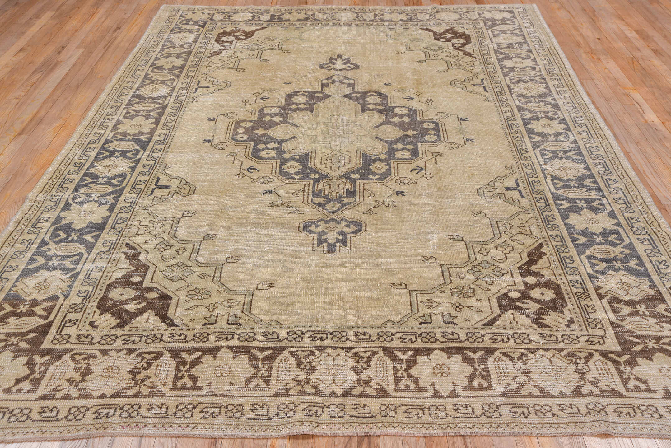 7' x 10' one-of-a-kind handmade vintage Oushak large size rug. Color palette: ivory, taupe, brown, beige, camel, charcoal