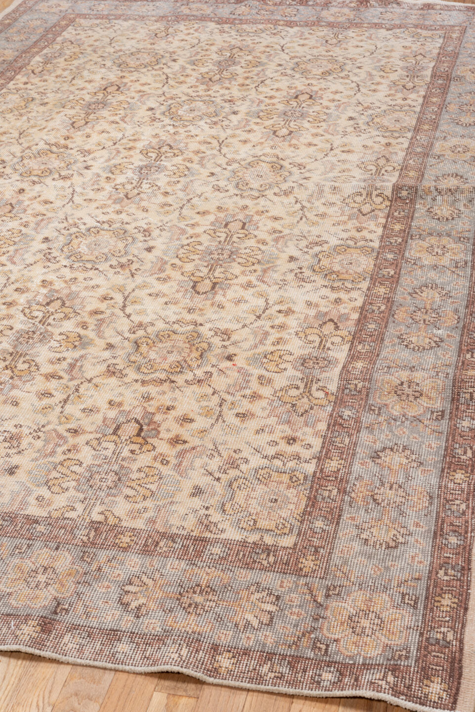 5' x 9' one-of-a-kind handmade vintage Oushak medium size rug. Color palette: ivory, taupe, brown, pale blue, beige, camel
