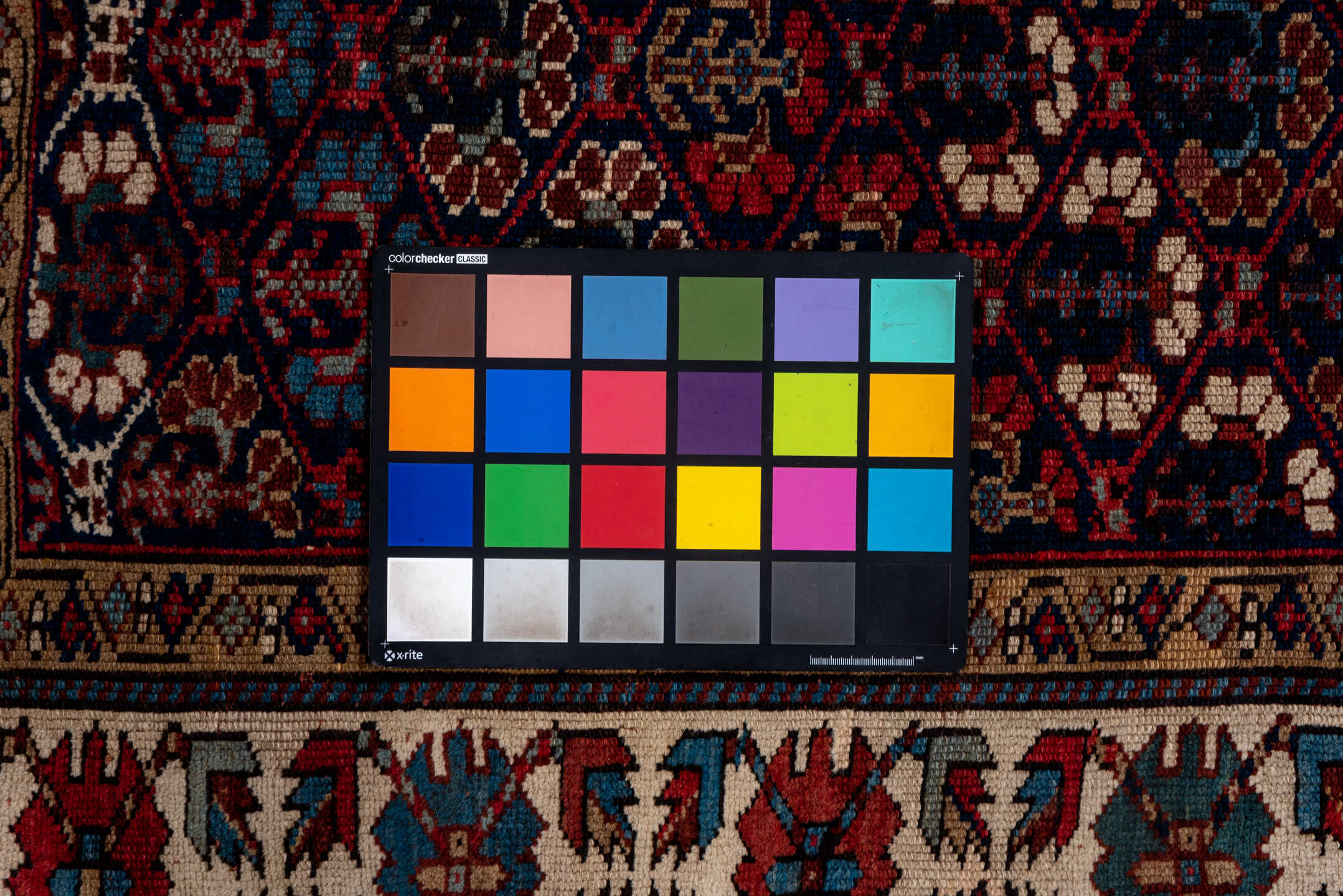 3' x 12' one-of-a-kind handmade antique NW Persian runner rug. Color palette: indigo, ivory, rust, sky blue, crimson, navy