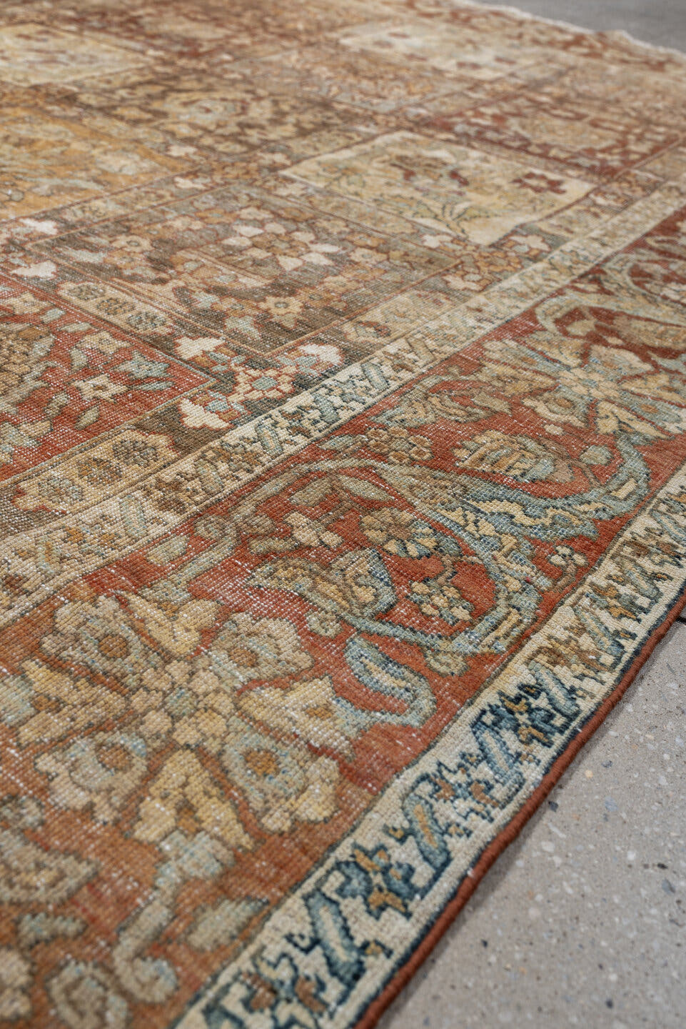4' x 6' one-of-a-kind handmade antique Baktiary small size rug. Color palette: terracotta, ivory, pale blue, taupe, camel