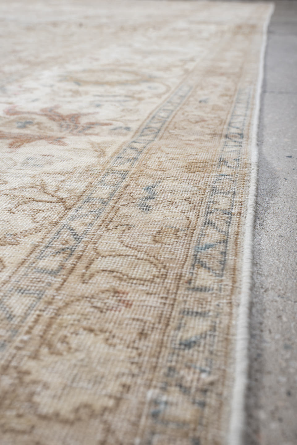9' x 18' one-of-a-kind handmade antique Tabriz rug. Color palette: ivory, taupe, beige, camel, pale blue, sage, soft gold