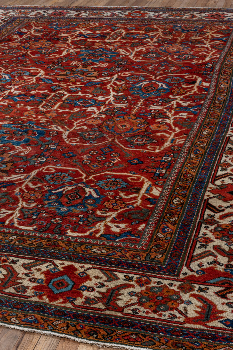 8' x 12' one-of-a-kind handmade vintage Mahal large size rug. Color palette: rust, ivory, navy, sky blue, terra cotta, camel