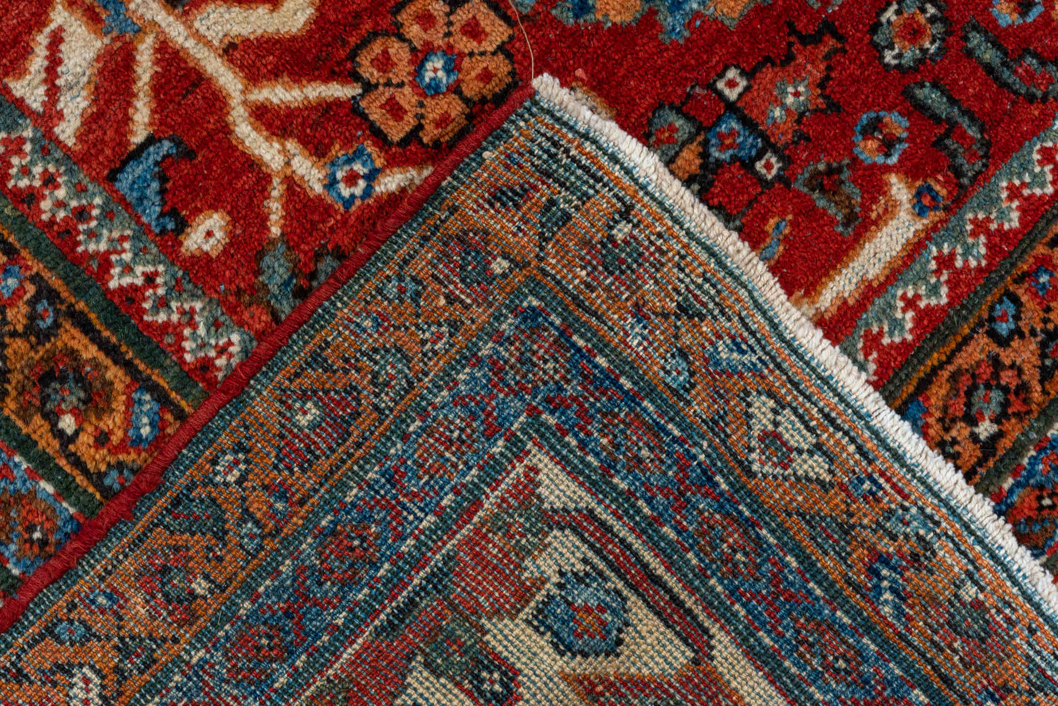 8' x 12' one-of-a-kind handmade vintage Mahal large size rug. Color palette: rust, ivory, navy, sky blue, terra cotta, camel