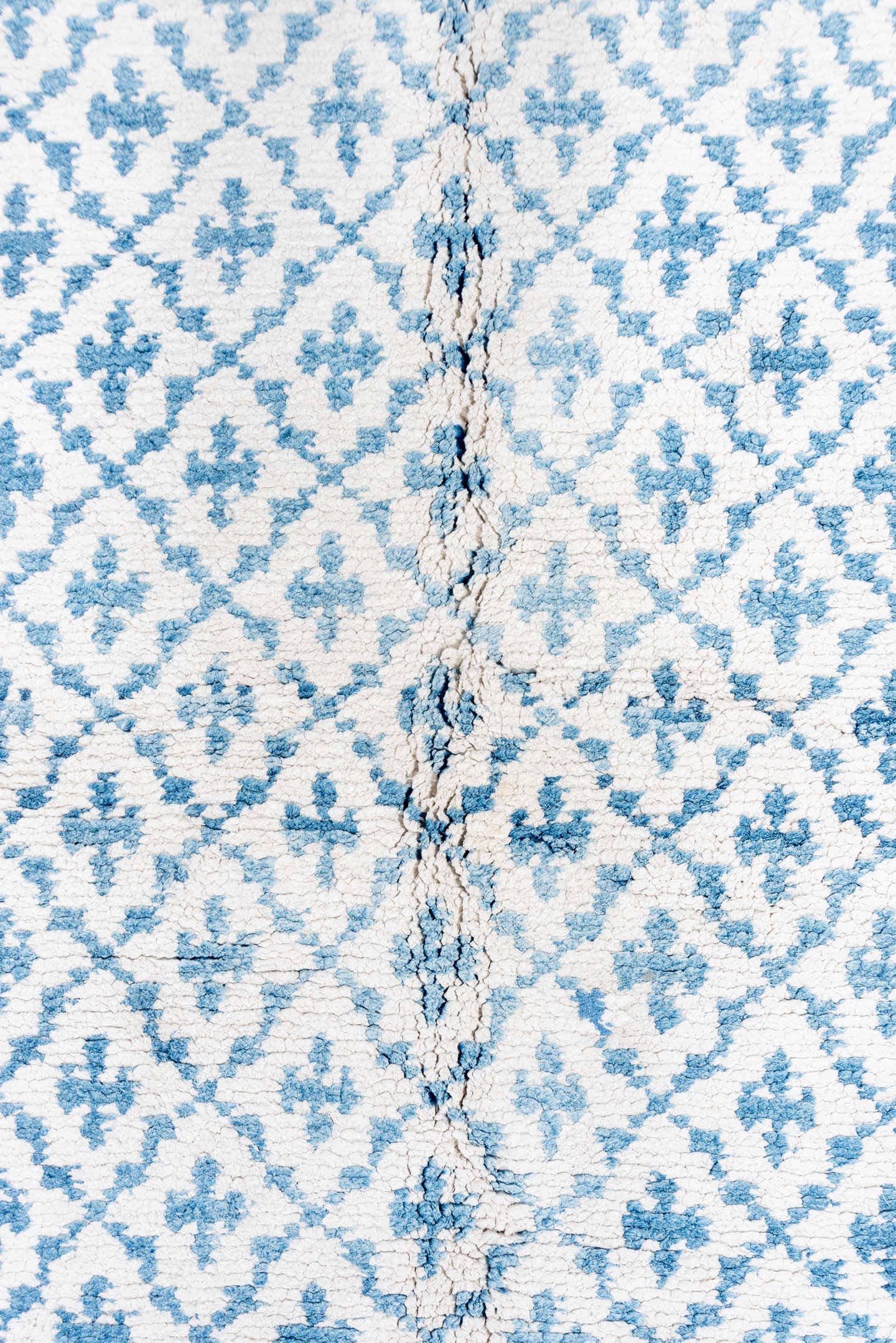 5' x 9' one-of-a-kind handmade vintage Cotton Agra medium size rug. Color palette: ivory, sky blue, powder blue, light blue