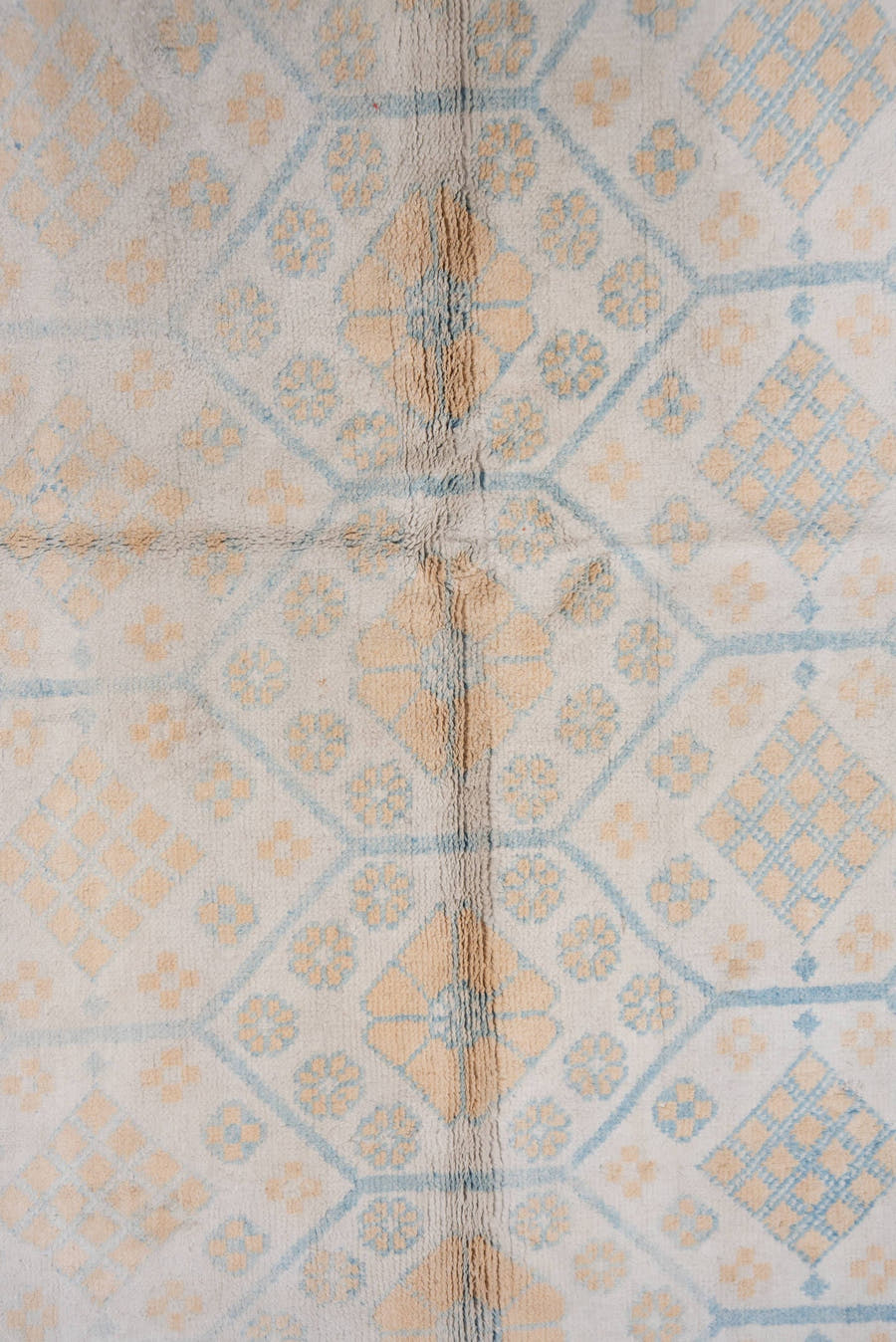 4' x 7' one-of-a-kind handmade vintage Cotton Agra rug. Color palette: ivory, pale blue, peach, sky blue, cream, taupe