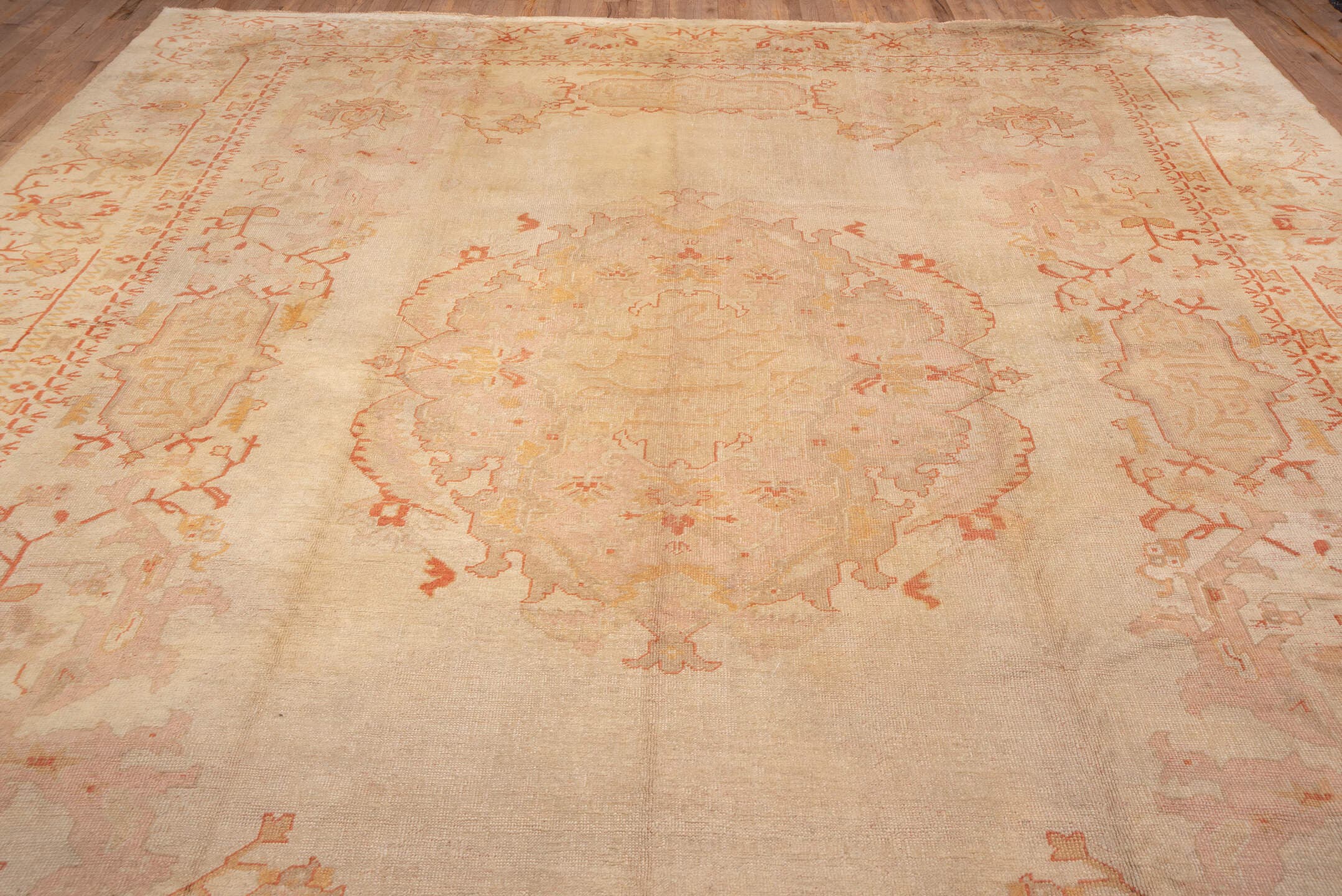 11' x 14' one-of-a-kind handmade antique Oushak oversize rug. Color palette: ivory, beige, blush, peach, taupe, sand