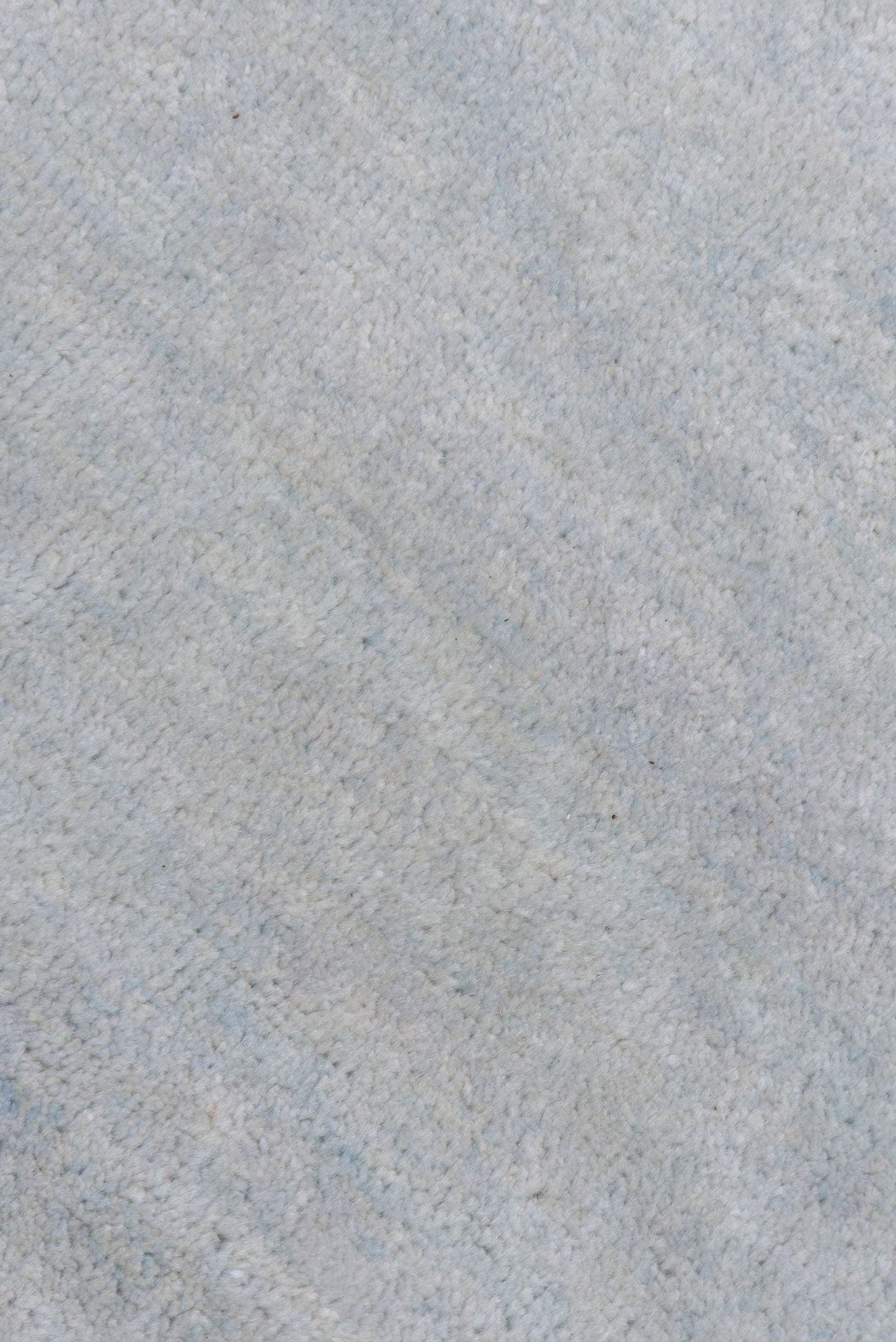 9' x 12' one-of-a-kind handmade vintage Rad large size rug. Color palette: ivory, pale blue, cream, taupe, light blue, beige