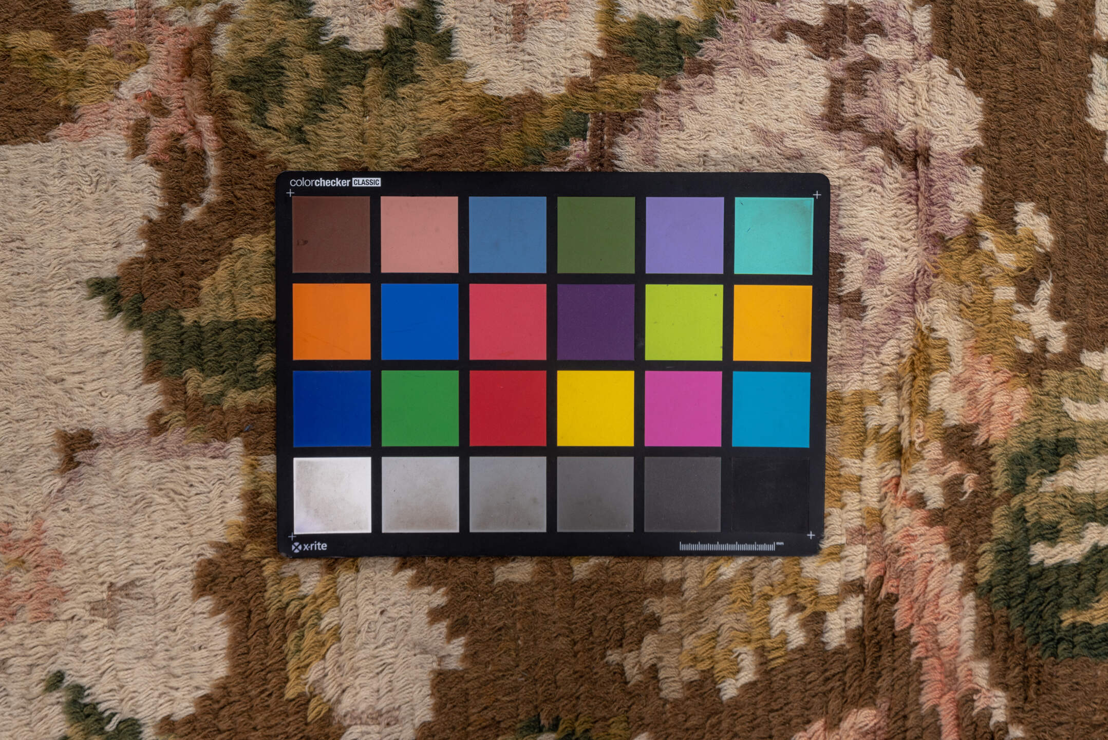 5' x 6' one-of-a-kind handmade vintage Rya-Swedish rug. Color palette: brown, gray, off-white, orange, pink, rosy brown